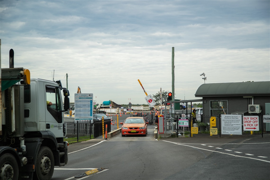 The entrance to the huskisson depot with a car on the weighbridge.