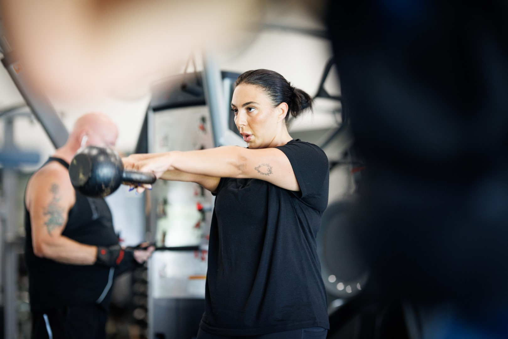 Patron performing a kettlebell swing in the gym at Ulladulla Leisure Centre