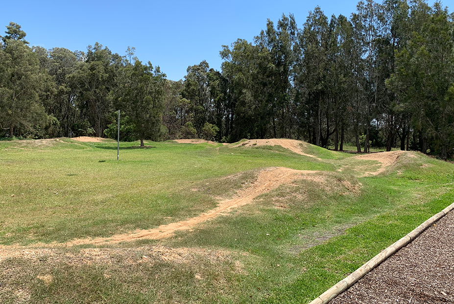 Dirt pump track and berms